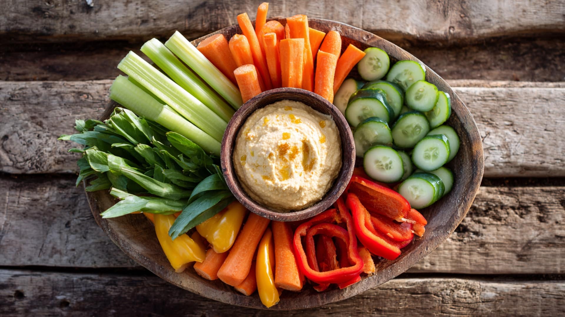 Hummus-With-Carrot-Cucumber-And-Bell-Pepper-Sticks-On-Platter